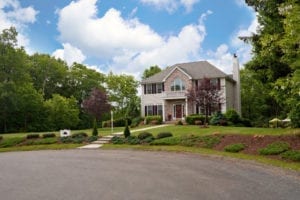 A modern custom built luxury home in a residential cul-de-sac neighborhood. This high end house is very nicely landscaped property.